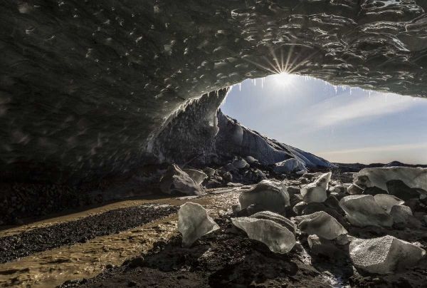 Iceland Sunburst at ice cave entrance